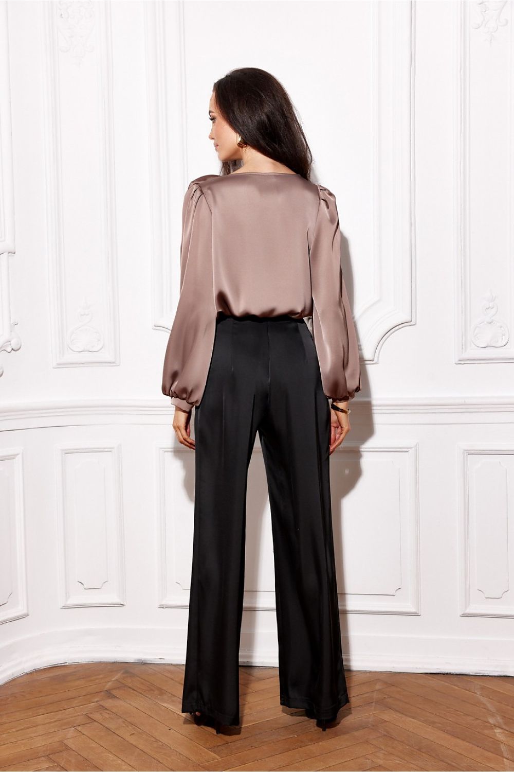 Chic Evelyn Satin Blouse with Rose Detail from Roco Fashion, perfect for festive outings, styled elegantly with complementary outfits.