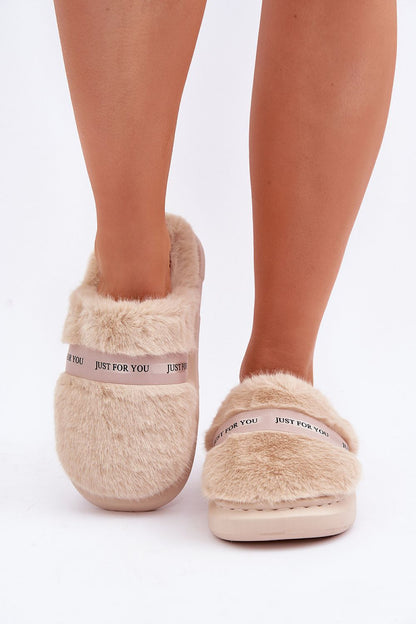 Luxurious furry women's slippers by Step in style, showcasing soft cozy fur and elegant design.