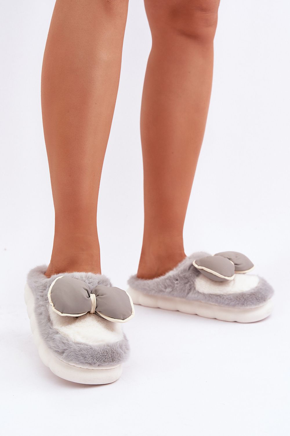 Charming Women's Cozy Fur Slippers with Bow by Step in Style, perfect for cold days with their covered toes and soft fur interior.
