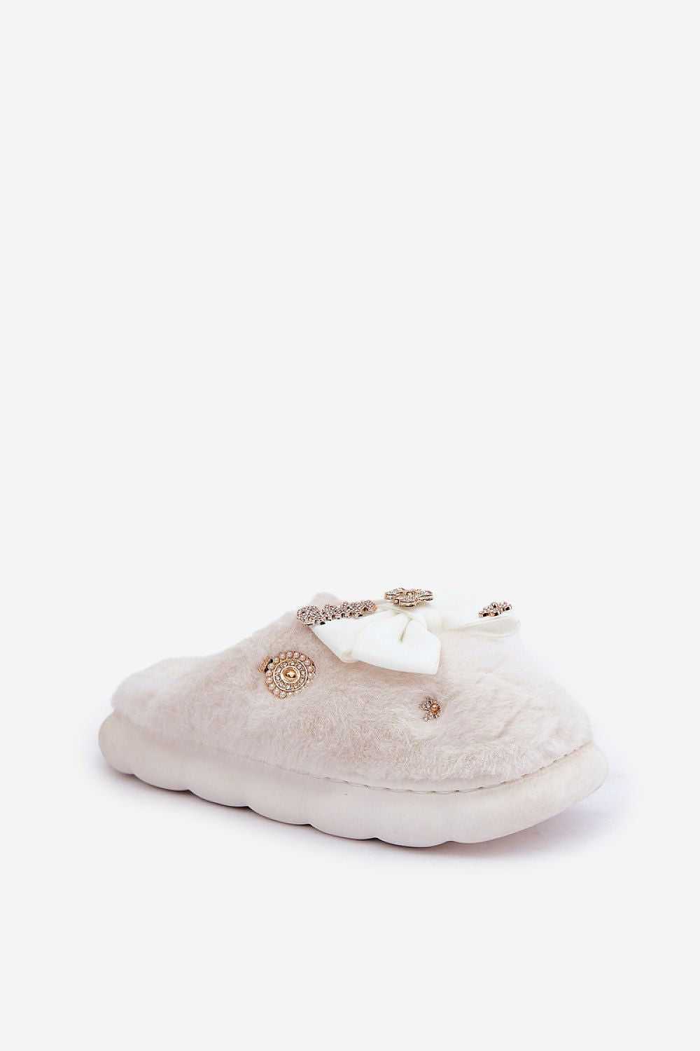 Luxurious Furry Slippers by Step in Style, featuring soft fur and adorned with stylish buttons and a bow, perfect for home comfort.