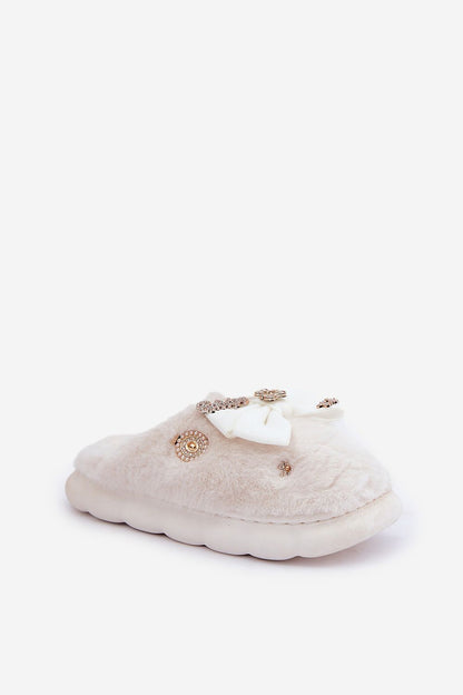 Luxurious Furry Slippers by Step in Style, featuring soft fur and adorned with stylish buttons and a bow, perfect for home comfort.