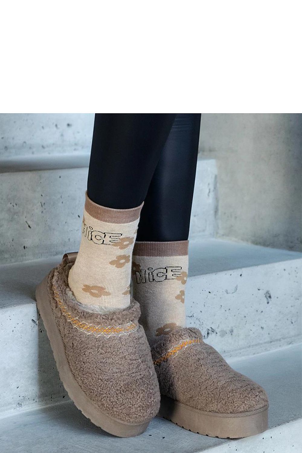 Solea Brown Snow Boots featuring a low shaft and embroidered pattern, designed for comfort and style. Available in EU sizes 36 to 41 (US sizes 5.5-10.5), these luxurious slip-on winter boots combine practicality with a chic aesthetic, ideal for cold weather.