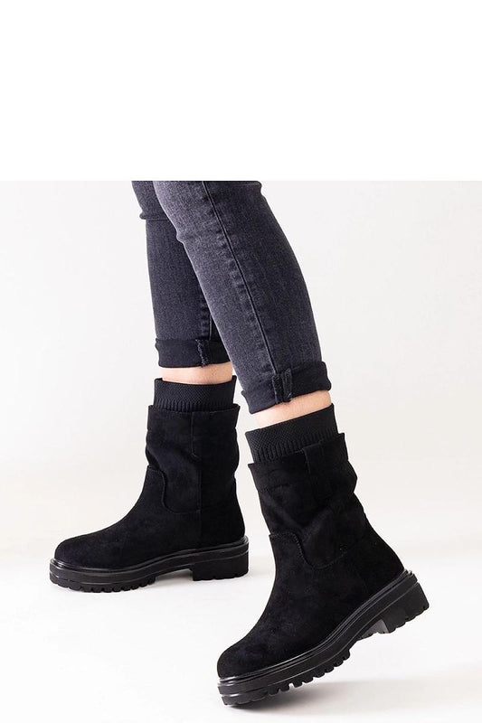 Elegant Solea Ankle Height Slip-On Boots Ralia in eco leather, showcasing stylish design and ultimate comfort, perfect for autumn and winter sophistication.