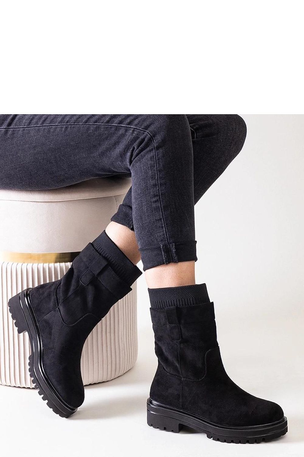 Luxurious Solea Ankle Height Slip-On Boots Ralia, crafted from eco leather, exemplifying stylish comfort with a chic round toe and practical slip-on design.