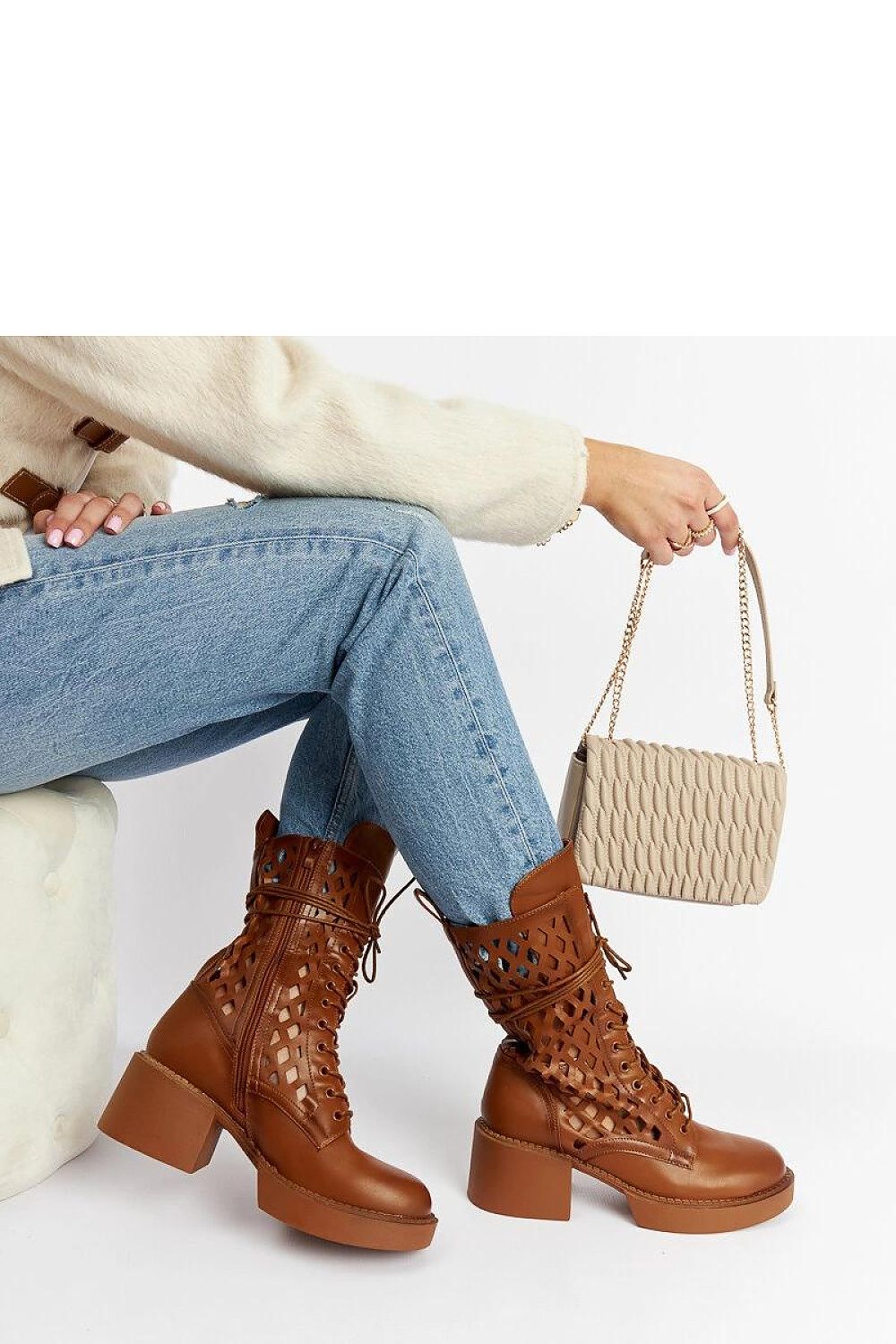 Elegant brown lacy ankle boots with a 6cm heel made from eco leather by Solea, perfect for stylish winter outfits.