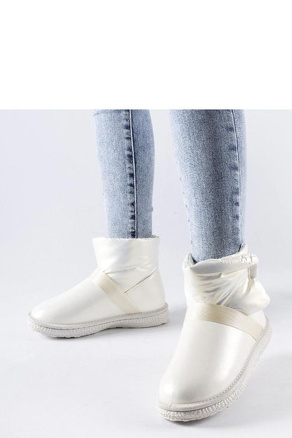 Sophisticated brown Delaune snow boots by Solea, featuring a platform for added height and elegance.