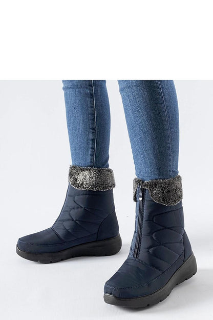Luxurious navy blue snow boots by Solea featuring a modern design with a round toe and high shaft, perfect for winter fashion.