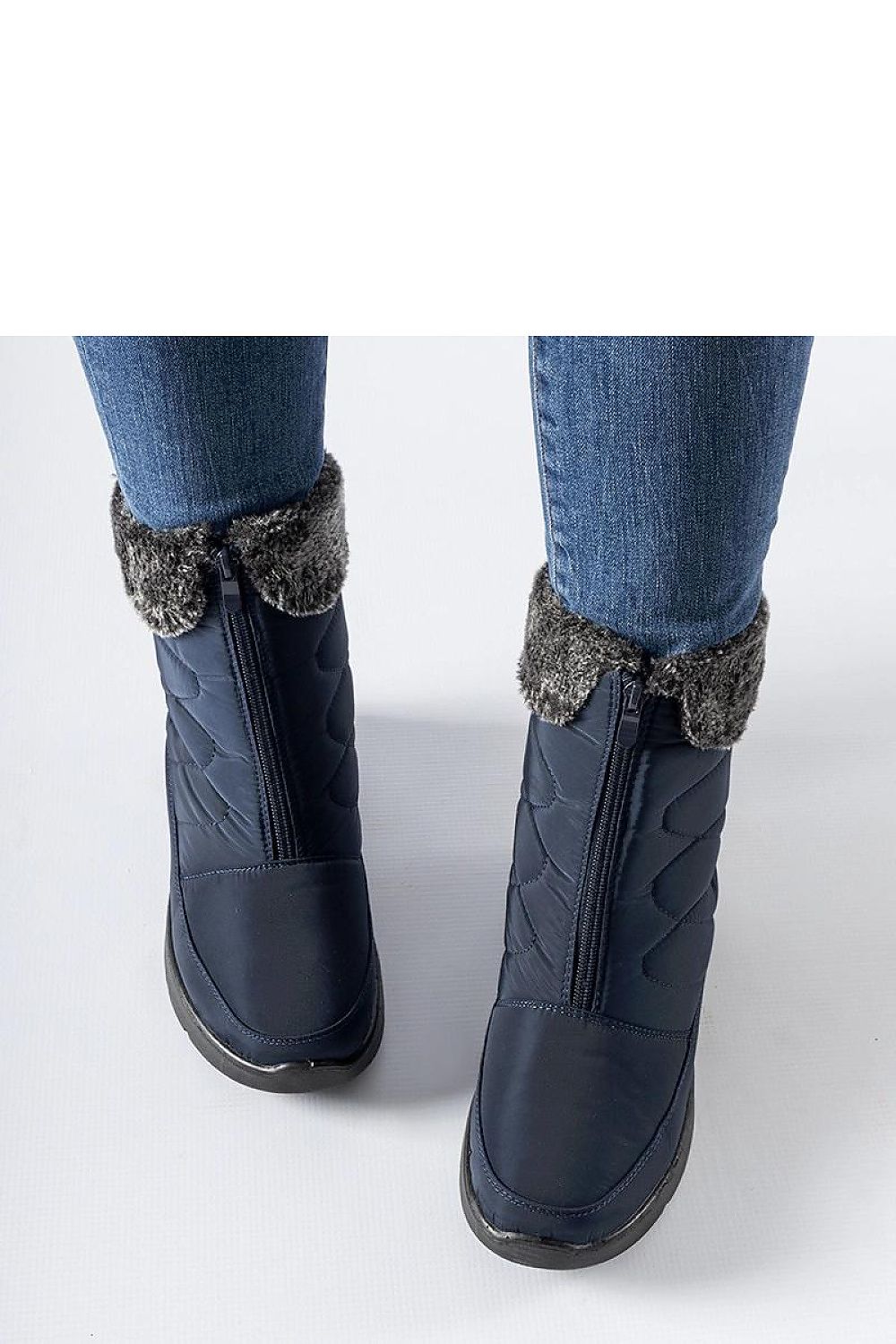 Solea's stylish winter snow boots showcasing a Brownton wedge and convenient zip fasteners for easy wearability.