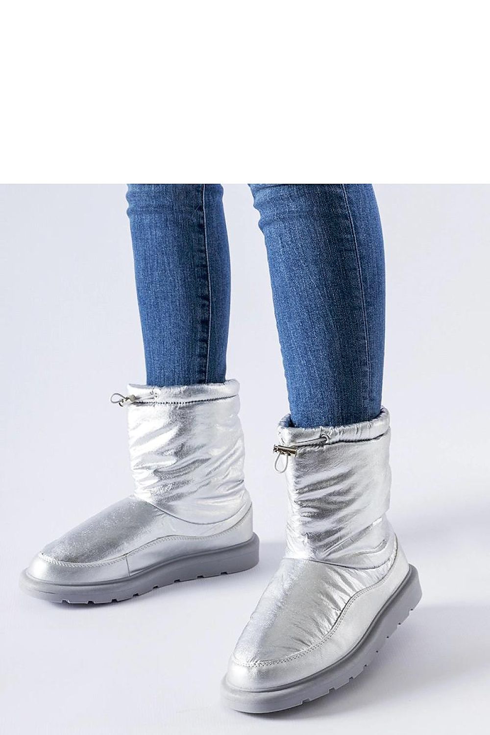 Elegant Solea Whitetail Silver Insulated Snow Boots for women, showcasing a luxurious slip-on design and warm insulation, perfect for winter styling.
