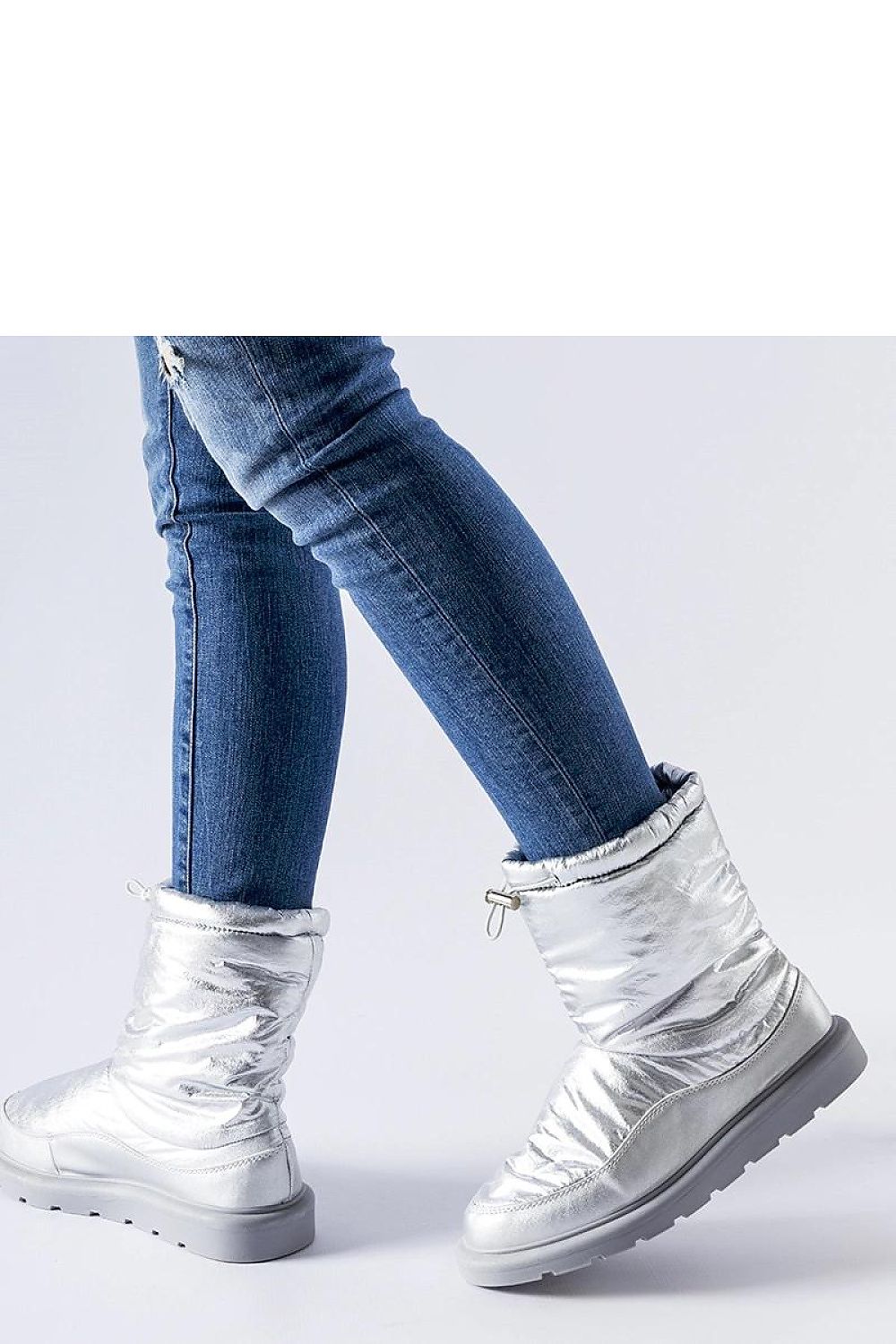 Sophisticated Solea Whitetail Silver Insulated Snow Boots with a modern platform and round toe, combining fashion and practical comfort for winter wear.