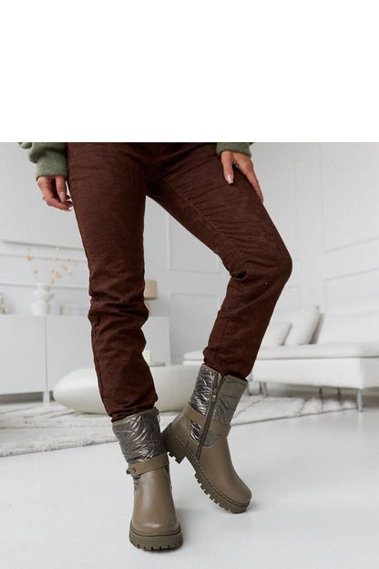 Side profile of Solea Green Insulated Lido Ankle Boots featuring a practical side zipper, perfect blend of fashion and function for cold weather.