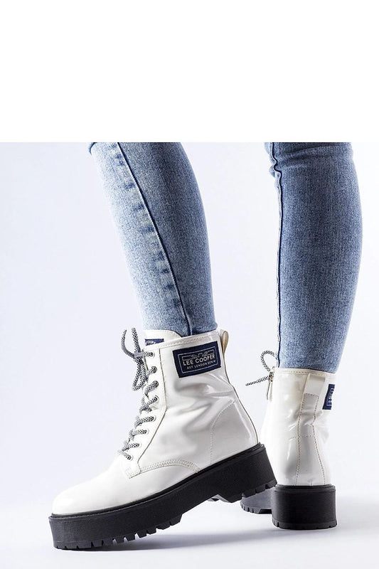 Close-up of luxurious white patent leather ankle boots by Lee Cooper LCJ-21-47-0666LB with lace-up closure, showcasing quality craftsmanship from Solea.