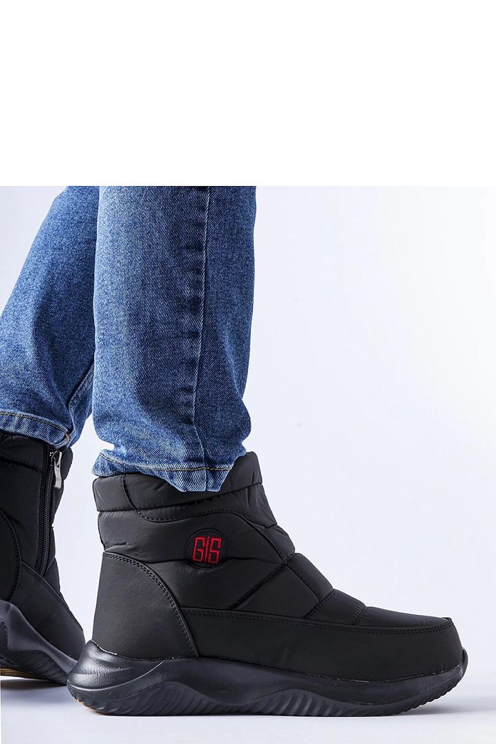 Solea luxurious black short snow boots featuring insulated comfort, elegant zipper closure, and a stylish round toe design, perfect for winter walks.