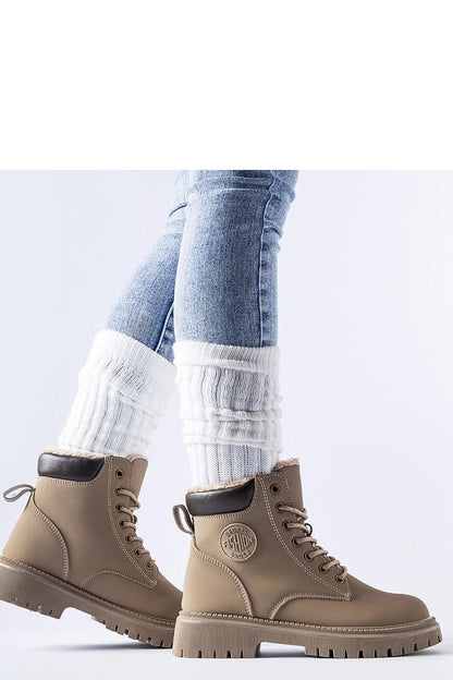 Close-up image of the high rubber sole of the Solea Medole winter boots, highlighting excellent grip suitable for winter conditions and outdoor activities.