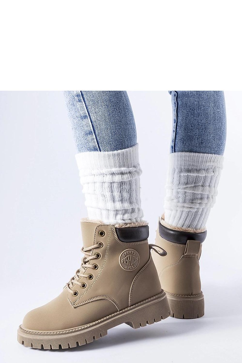 Side view of the chic brown insulated Medole winter boots by Solea, emphasising the elegant high cut and eco leather fabric, perfect for fashionable winter wear.