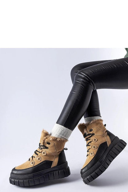 Luxurious beige Cervantes ankle boots by Solea, featuring a massive sole and crafted from eco-friendly leather, perfect for autumn and winter styling.