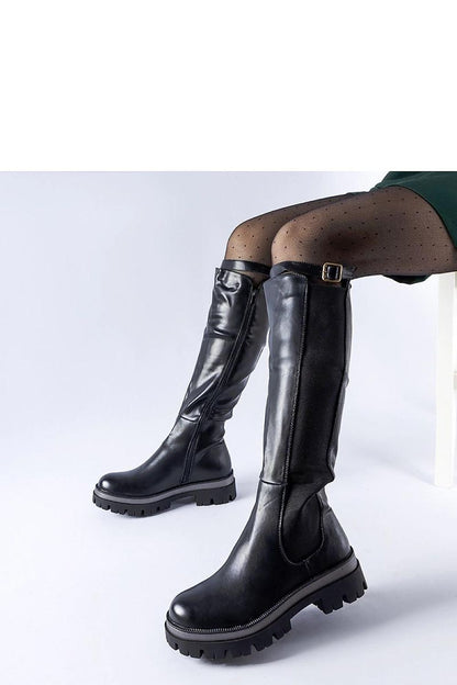 Elegant Solea luxury black thigh-high boots with decorative Stuart strap, ideal for winter fashion. Crafted from high-quality eco-leather with a comfortable medium heel and warm interior. Perfect for stylish and practical everyday wear.