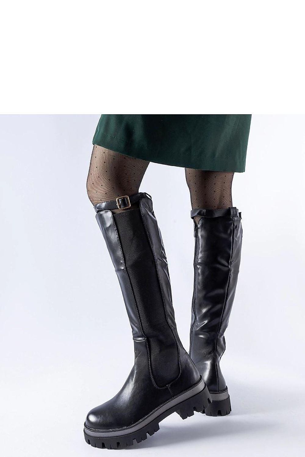 Elegant Solea black thigh-high boots with medium heel and zipper closure, designed for comfort and chic winter fashion.