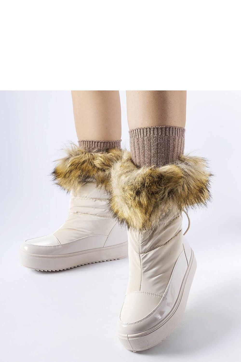Solea insulated snow boots in beige, showcasing modern slip-on style and plush fur for winter elegance.
