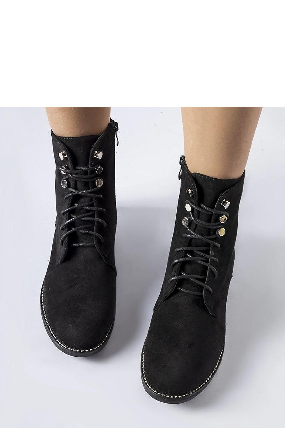 Elegant black insulated ankle boots by Solea in eco-suede, showcasing a high shaft and laced closure, perfect for stylish winter outfits.