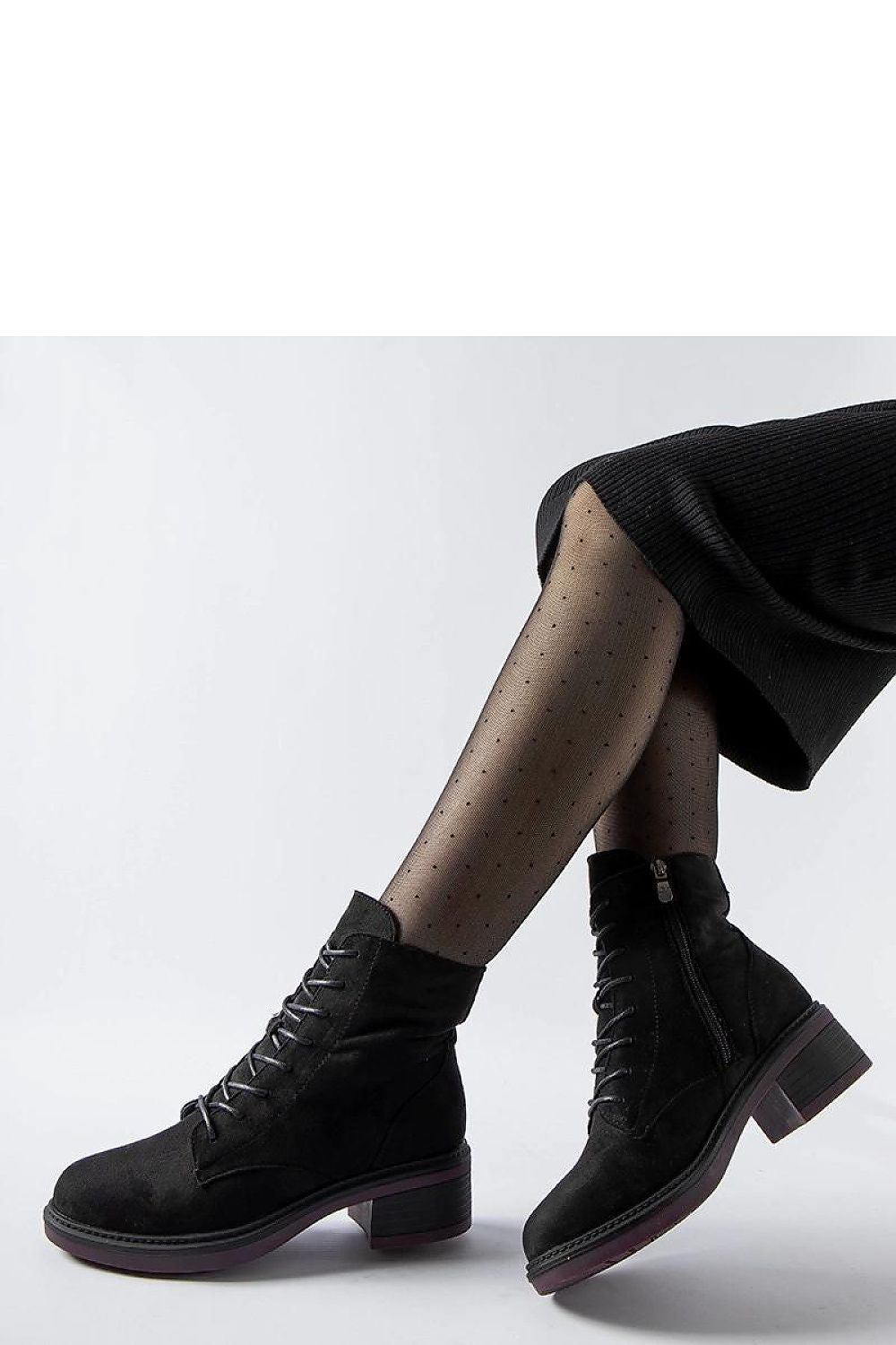 Solea luxury classic black ankle boots featuring a distinctive purple sole, designed for elegance and comfort, perfect for autumn-winter wear, EU sizes 36-41.