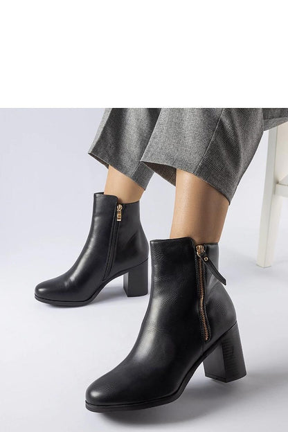 Elegant Solea black insulated ankle boots Edilio with 8cm heel in eco leather, designed for winter comfort and style.
