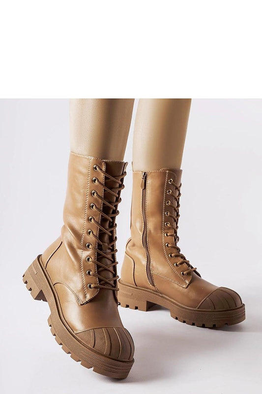 Elegant brown insulated women's work boots by Solea, showcasing a high-cut design and practical laced closure for winter style and functionality.