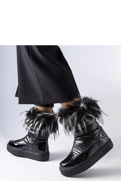 Solea Black Insulated Snow Boots displayed on a snowy background, demonstrating their perfect blend of functionality and luxury for cold weather adventures.