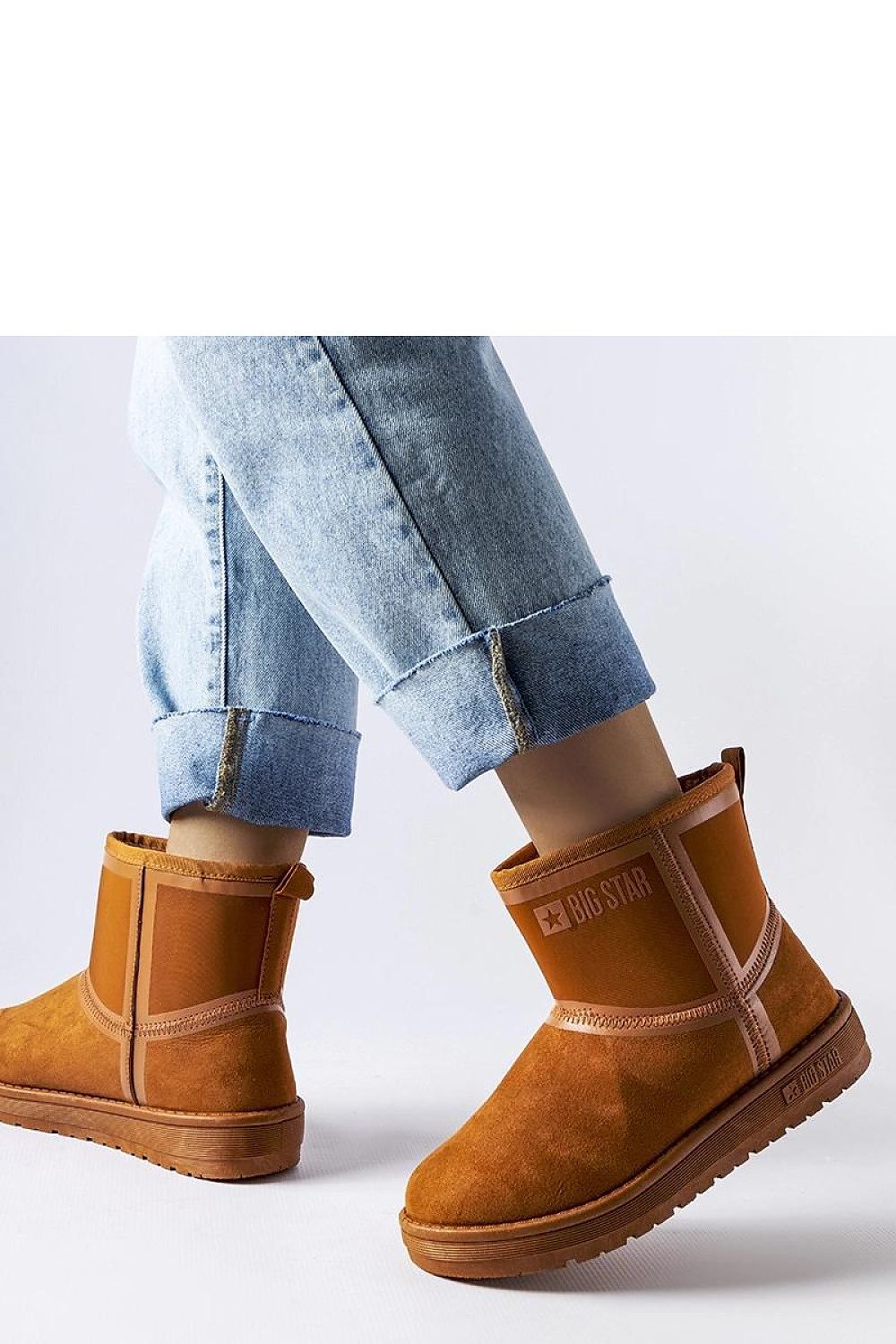 Luxurious brown snow boots for women by Solea, crafted from warm eco leather with a stylish ankle height design, perfect for winter elegance.