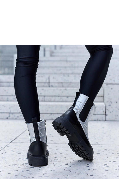 Close-up of Solea Women's Galvani Snow Boots with focus on rubber sole providing strong grip and flat heel for stability in winter conditions.