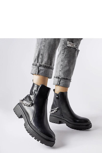 Luxury brown ankle boots from Solea featuring elegant chain decoration and a stylish round toe, perfect for winter wear.