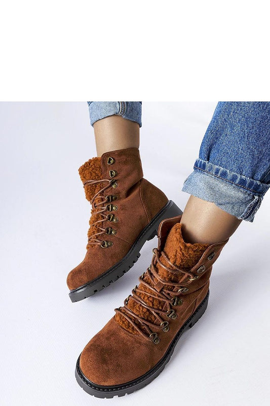 Close-up of Solea eco-suede ankle boots, highlighting the intricate detailing and lace-up closure that combine style and comfort for the modern woman.