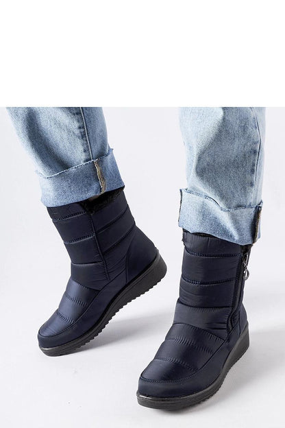 Elegant navy women's snow boots with low wedge by Solea, featuring an insulated design for warmth and stylish round toe, perfect for winter fashion.