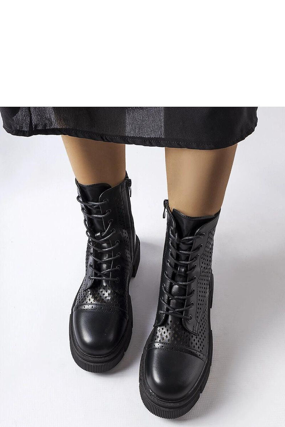 Stylish Solea Black Lacy Ankle Boots Corpus showcased with a refined round toe and convenient zipper, perfect for both casual and elegant outfits.