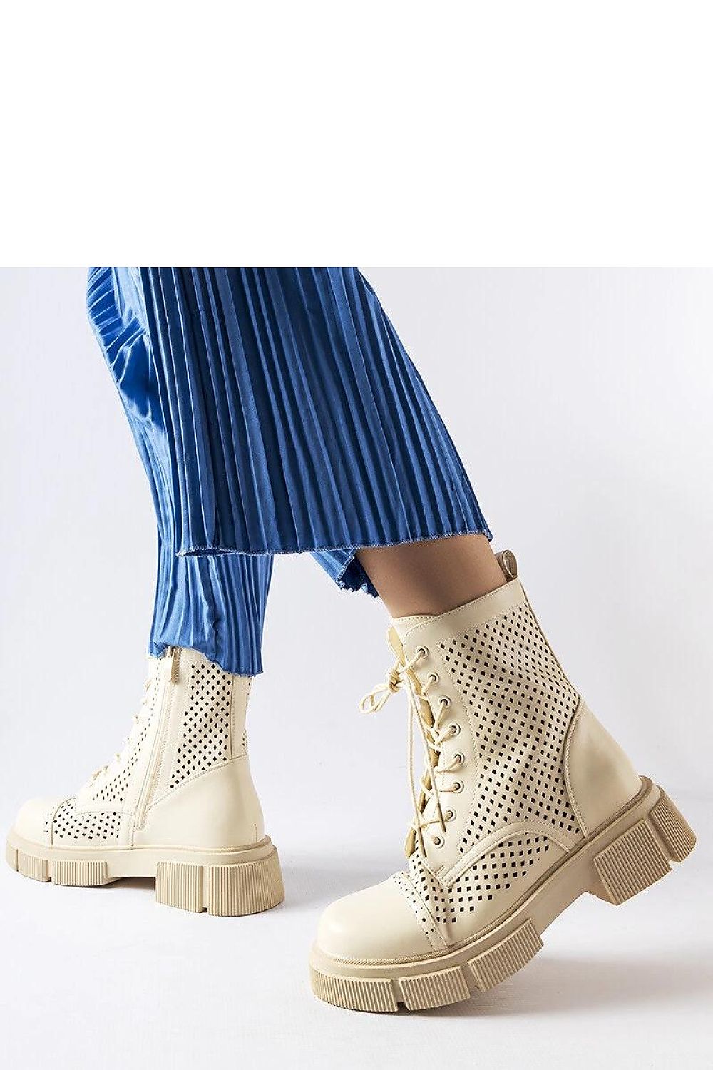 Side view of Solea black lacy ankle boots Corpus, showcasing the stylish high cut and flat heel, perfect for both casual and elegant outfits.