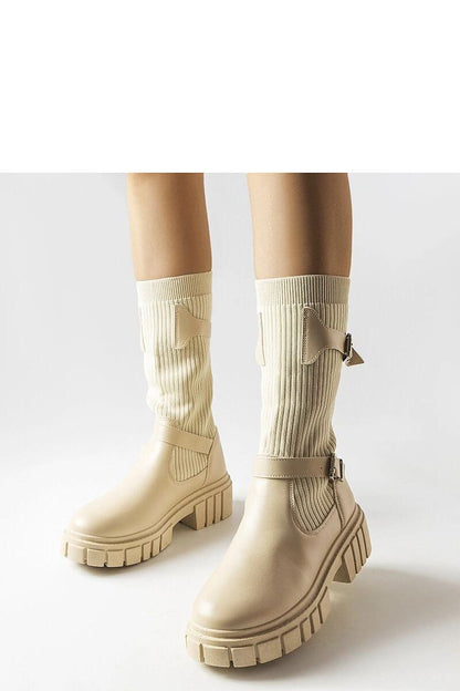 Solea stylish black thigh-high boots Ida worn with a fashionable outfit, exemplifying comfort and elegance for colder days.