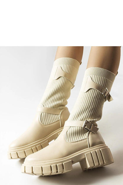 Solea black thigh-high boots Ida displayed with focus on the durable rubber sole providing excellent grip in winter conditions.