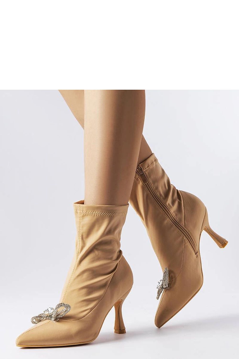 Solea Elegance beige ankle boots with rhinestone bow detail, showcasing luxurious design and 8cm heel for stylish comfort in autumn-winter fashion.