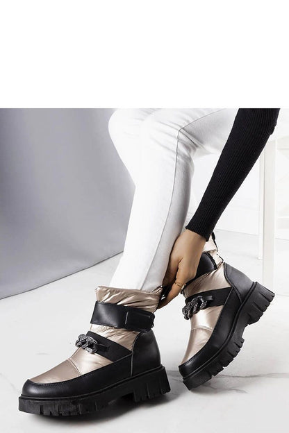 Solea Luxury Golden Snow Boots featuring a stylish chain design, made of eco leather and waterproof material, ideal for winter adventures.