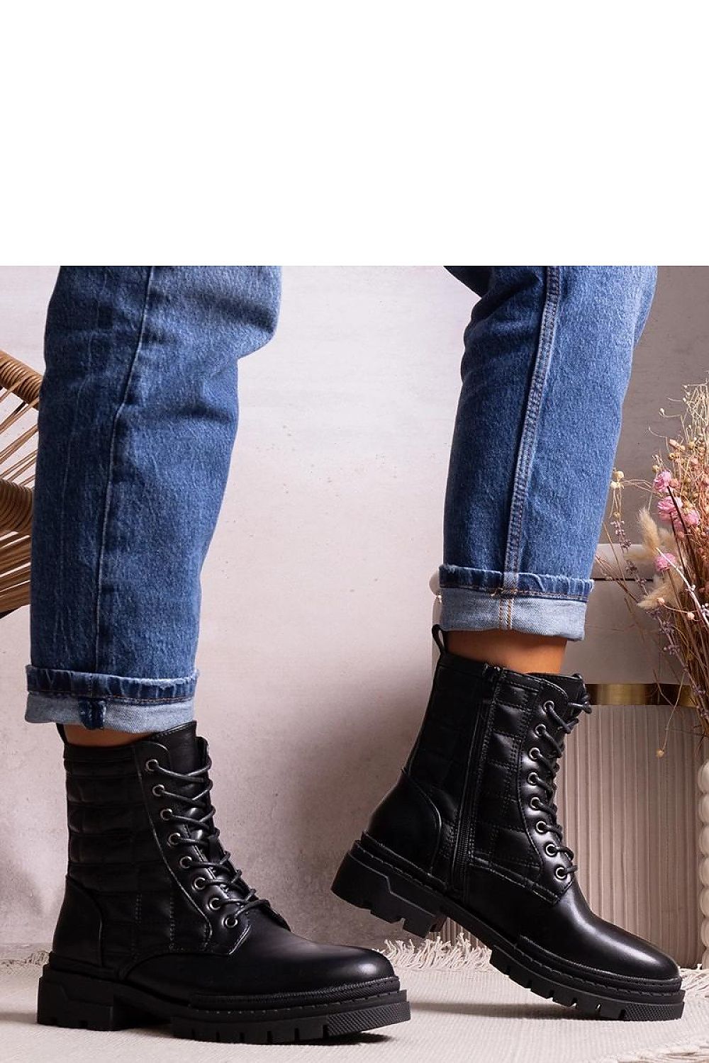 Close-up of Solea Black Tellin Sneakers highlighting the sleek black rubber sole and sophisticated craftsmanship for versatile footwear.