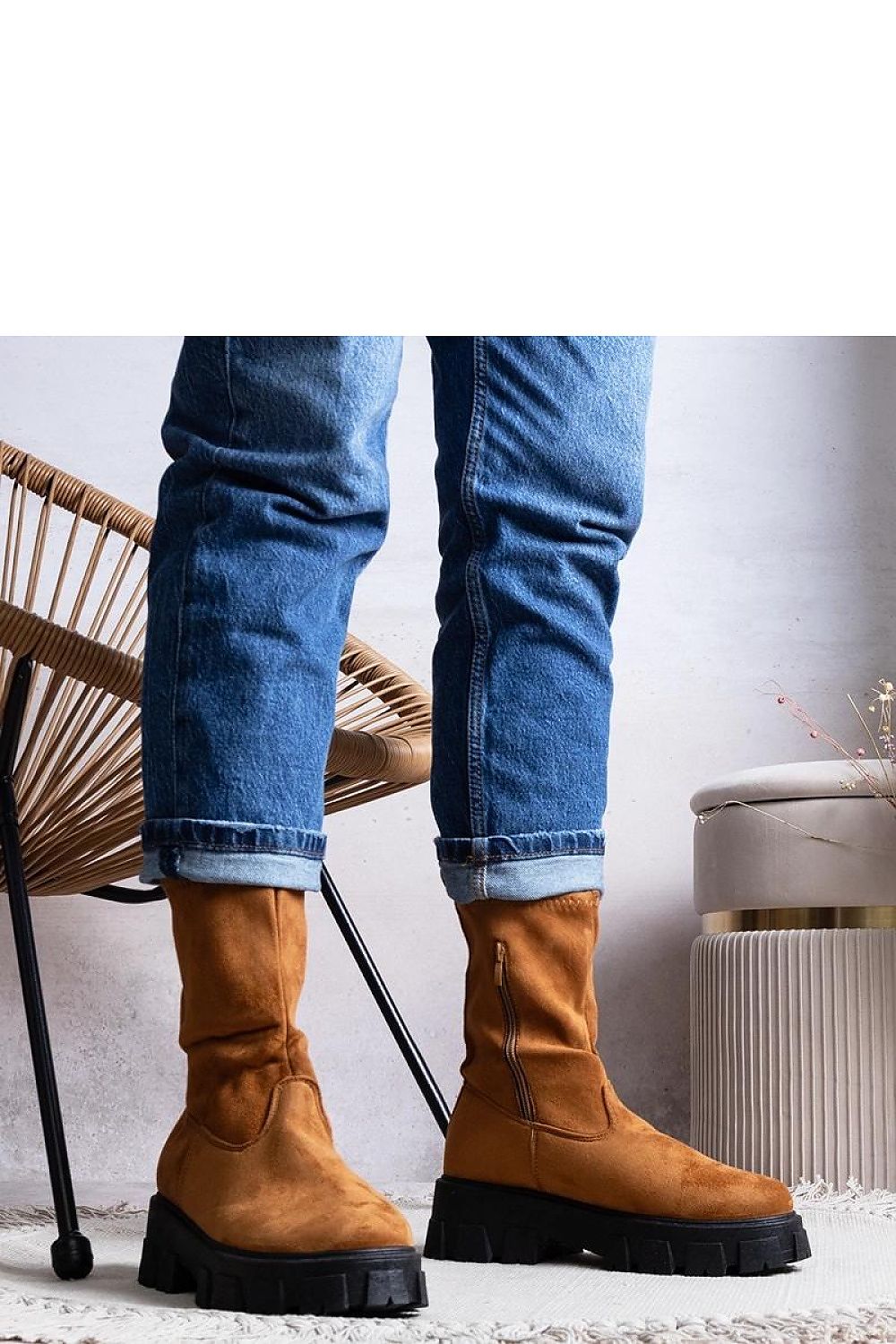 Luxurious brown faux suede ankle boots featuring a rubber sole, designed by Solea for warmth and sophistication in cooler weather.