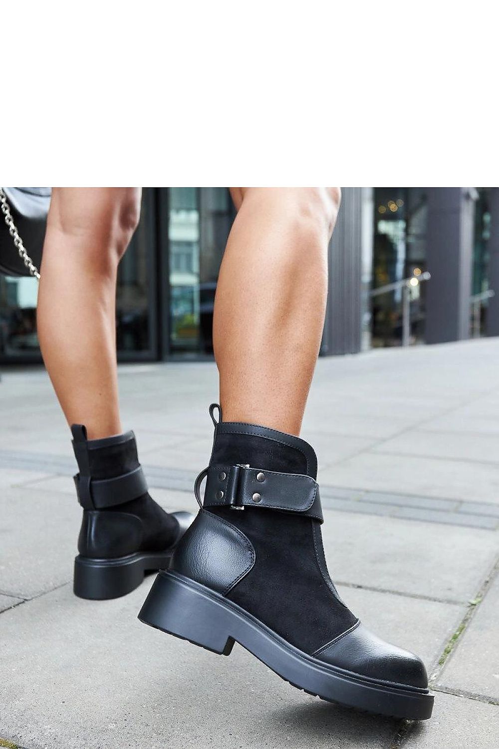 Close-up view of Solea Elbika Ankle Boots featuring velcro closure and sophisticated eco-suede design, offering a luxurious look for fashionable women.