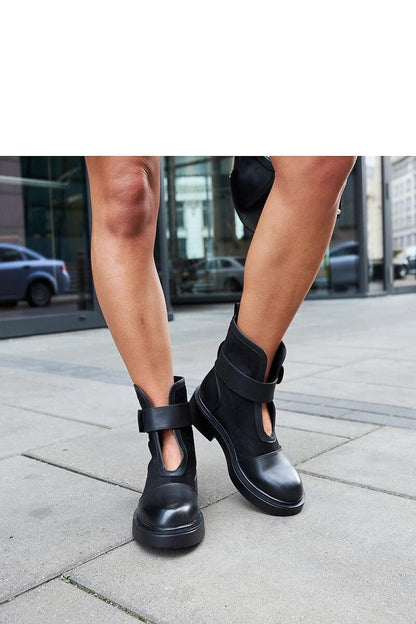 Solea Elbika Ankle Boots footwear styled with seasonal outfits, demonstrating versatility and comfort for modern women in sizes EU 36 to 41.