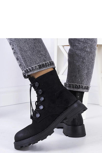 Luxurious Solea black eco-suede Chesterfield ankle boots with thick soles, ideal for autumn and winter outdoor elegance.