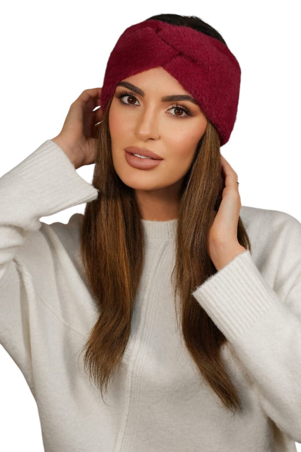 A model wearing the Kamea Yoshi Winter Fluffy Headband in luxurious bottle green, illustrating its perfect blend of style, comfort, and elegance.