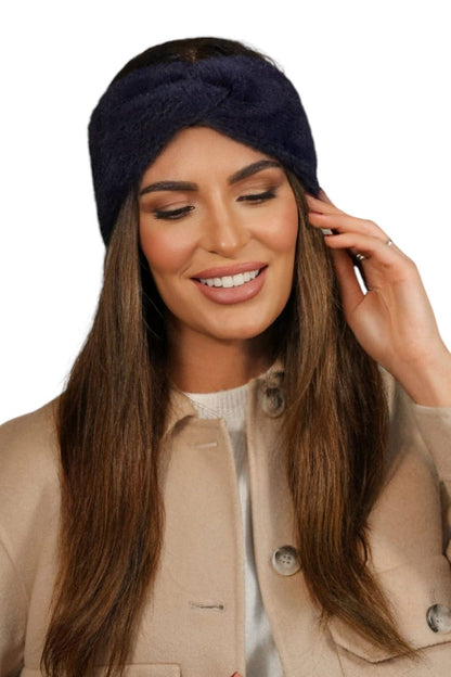 Close-up of Kamea bottle green fluffy headband showcasing the soft polyamide texture and exquisite loop detail for added charm.