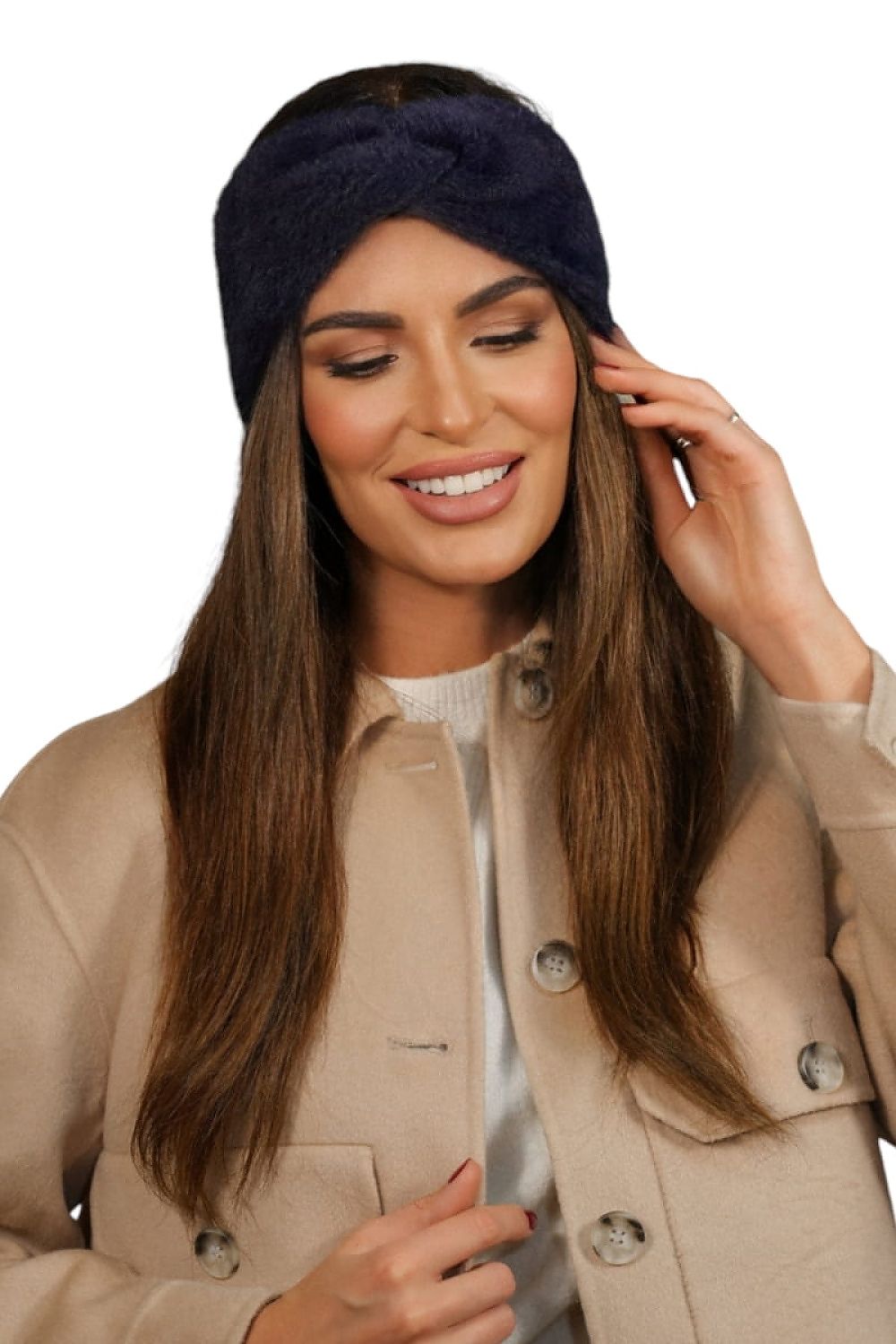 Kamea sophisticated winter headband worn on a model, highlighting its stylish design and luxurious bottle green colour.