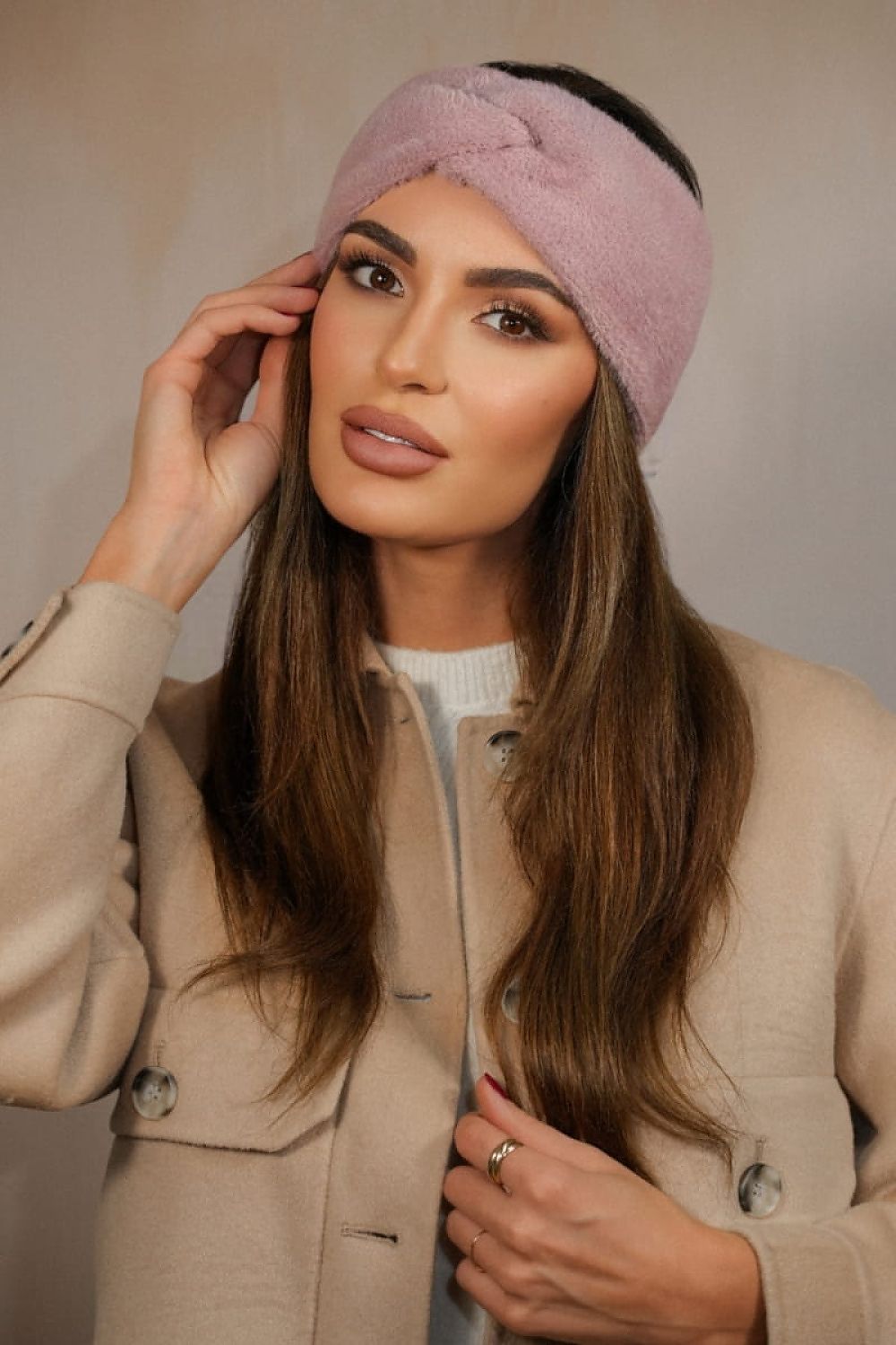 Close-up of Kamea Yoshi Fluffy Headband, highlighting its luxurious soft fabric and elegant bottle green hue, ideal for every sophisticated woman.