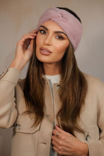 Close-up of Kamea Yoshi Fluffy Headband, highlighting its luxurious soft fabric and elegant bottle green hue, ideal for every sophisticated woman.