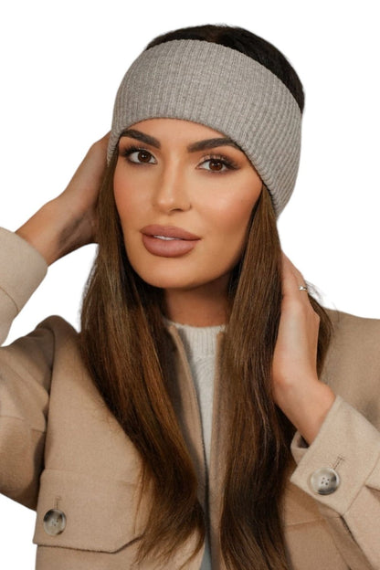 Kamea headband in vibrant raspberry, showcasing its unique ribbed design and premium composition, a must-have accessory for discerning fashion enthusiasts.